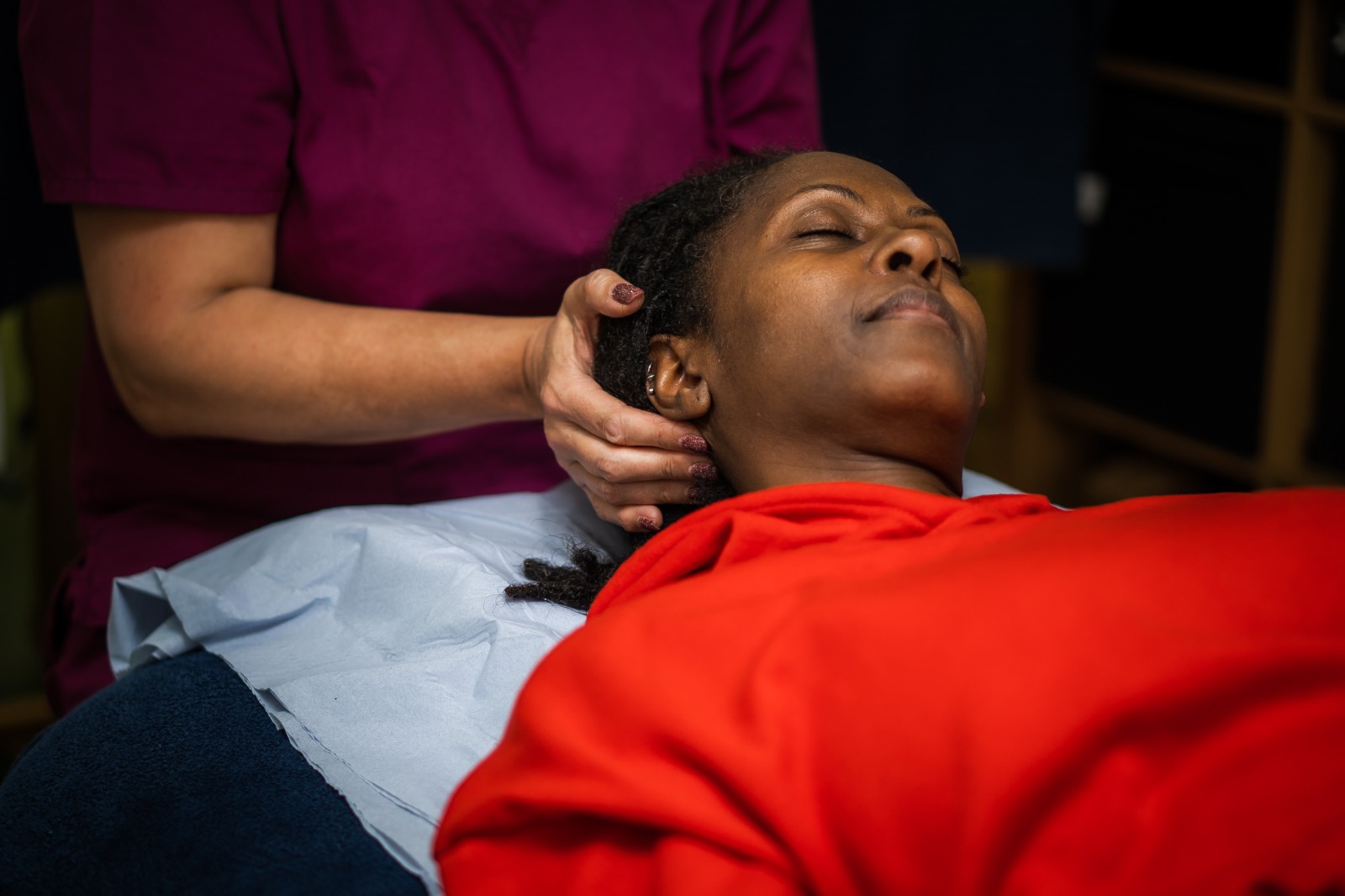Charlotte treating neck and shoulder pain from desk work at Amatsu Clinic Abergavenny